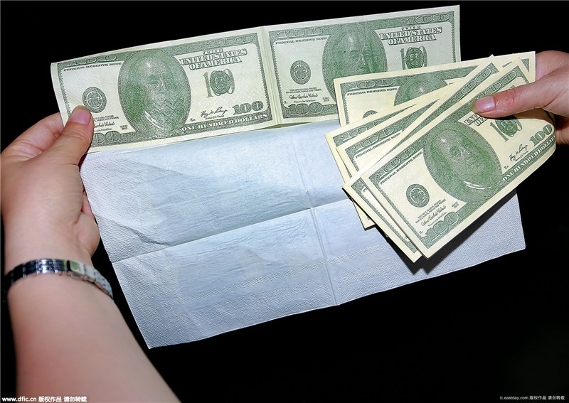 商家卖美钞纸巾吸引眼球 暴利与质量安全存疑