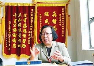 她走了,把名字和锦旗留在工作室——追记全国优秀人民调解员梁惠英
